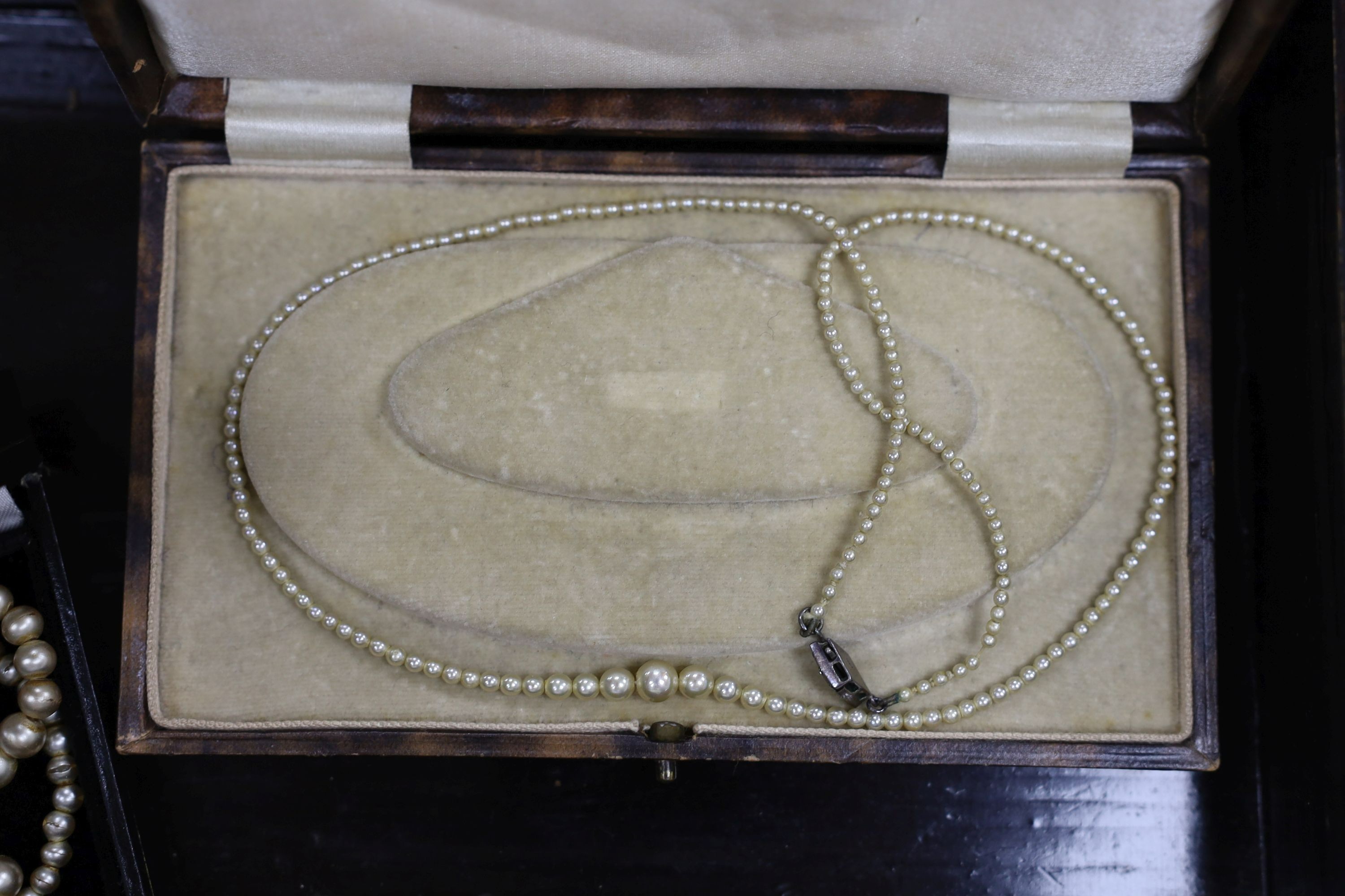 Assorted jewellery including costume, a silver brooch, an engraved yellow metal heart shaped locket, micro mosaic brooch etc. housed in an inlaid box.